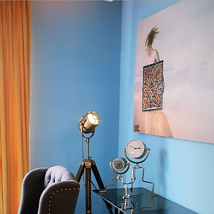 Painting of the Lady of the Beach, echo of Rumi's love and liberation, in a memory frame from Chargoosh Gallery